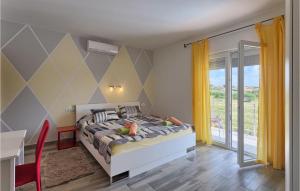 Ένα ή περισσότερα κρεβάτια σε δωμάτιο στο Villa Renata