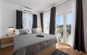 Łóżko lub łóżka w pokoju w obiekcie Villa Bella Area