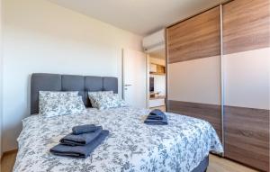 Posteľ alebo postele v izbe v ubytovaní 2 Bedroom Stunning Apartment In Solin
