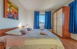 Posteľ alebo postele v izbe v ubytovaní Nice Apartment In Pakostane