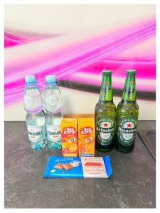 a group ofempty bottles of water and snacks at Apartament Pięć Mórz z basenem in Sianozety +47 photos
