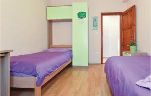Posteľ alebo postele v izbe v ubytovaní Three-Bedroom Holiday Home In Sibenik