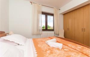 Postel nebo postele na pokoji v ubytování Holiday Home Privlaka 03