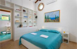 Ένα ή περισσότερα κρεβάτια σε δωμάτιο στο Villa Iva