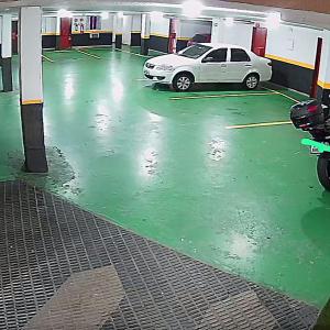 a car parked in a parking lot at Hotel Gold Park in Franco da Rocha