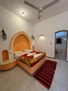 Postel nebo postele na pokoji v ubytování Hotel Sheherazade Luxor