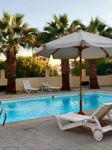 Bazén v ubytování Hotel Sheherazade Luxor nebo v jeho okolí