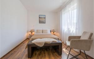 Postel nebo postele na pokoji v ubytování Holiday Home Vrecari 27
