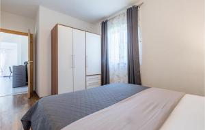 Postel nebo postele na pokoji v ubytování Holiday Home Vrecari 27
