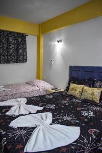 Katil atau katil-katil dalam bilik di Ullanka Apart Hotel