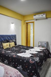 Katil atau katil-katil dalam bilik di Ullanka Apart Hotel