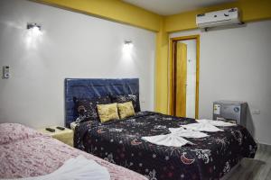 Katil atau katil-katil dalam bilik di Ullanka Apart Hotel