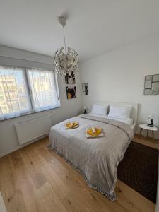 Ένα ή περισσότερα κρεβάτια σε δωμάτιο στο Apartment B Arena Zagreb