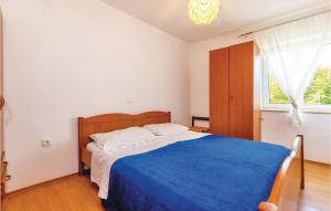 Posteľ alebo postele v izbe v ubytovaní Awesome Apartment In Novi Vinodolski