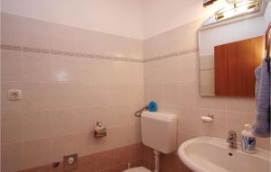 Koupelna v ubytování Apartment Plomin Iv