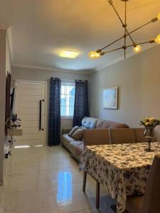 Coin salon dans l'établissement Casa na praia do Tabuleiro