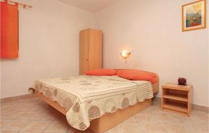 Postel nebo postele na pokoji v ubytování Apartment Vela Luka 36
