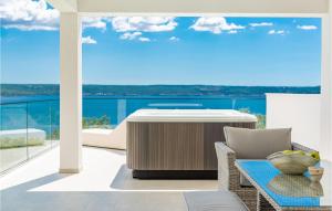 a living room with a view of the ocean at Villa Michelle in Maslenica