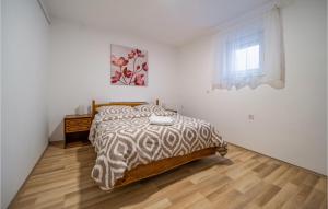 Postel nebo postele na pokoji v ubytování 1 Bedroom Lovely Apartment In Rakovica