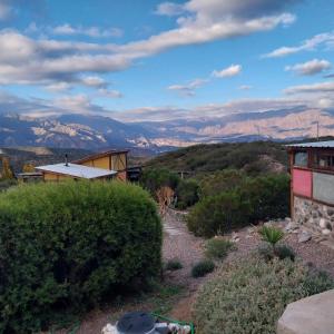 a view of the mountains from a house at Cabaña La Mostacita - Complejo El Taller in Potrerillos
