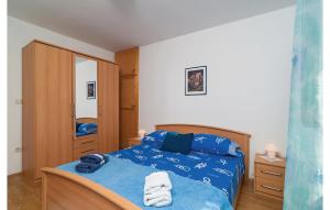 Postel nebo postele na pokoji v ubytování Apartment Supetar With Sea View Xii
