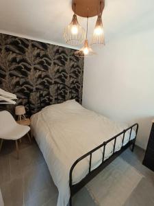 Posteľ alebo postele v izbe v ubytovaní SUPERBE APT VUE MER- 6 pers- HYPER CENTRE