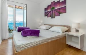Posteľ alebo postele v izbe v ubytovaní Gorgeous Apartment In Novi Vinodolski