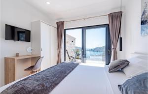 Posteľ alebo postele v izbe v ubytovaní 3 Bedroom Amazing Home In Blato