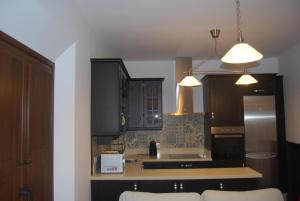 Kuchnia lub aneks kuchenny w obiekcie Apartamentos Bodeguetas