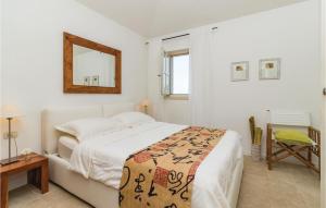 Postel nebo postele na pokoji v ubytování Three-Bedroom Holiday Home In Stifanici