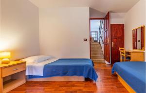 Postel nebo postele na pokoji v ubytování Two-Bedroom Apartment In Medulin