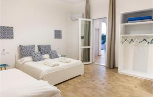 Posteľ alebo postele v izbe v ubytovaní Villa Selinon