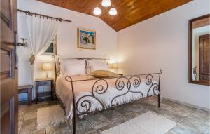 a bedroom with a bed in a room at Villa Maruka in Supetar