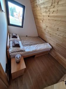 Voodi või voodid majutusasutuse Planinska kuća Vesna toas