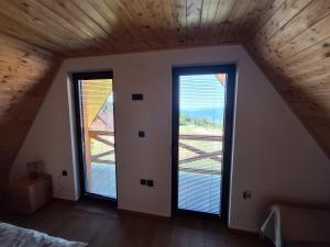 Voodi või voodid majutusasutuse Planinska kuća Vesna toas