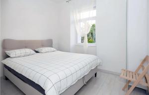 Posteľ alebo postele v izbe v ubytovaní 1 Bedroom Nice Apartment In Trogir