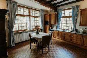 Kuchyň nebo kuchyňský kout v ubytování Herberg Erve Kots Logement + 33 fotografií