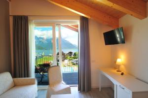 TV a/nebo společenská místnost v ubytování Hotel Resort Le Vele