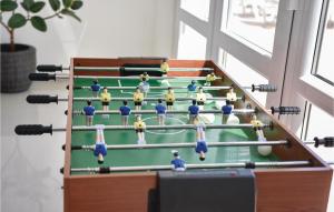 a group of lego men playing a game of snooker at Ten-Bedroom Holiday Home In Duce in Tice