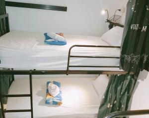 Postel nebo postele na pokoji v ubytování Chalok Hostel