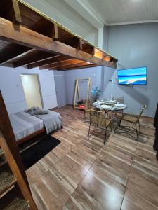 Ένα ή περισσότερα κρεβάτια σε δωμάτιο στο Loft house cataratas