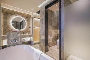 Phòng tắm tại Konggu Youlan Hotel Ningbo Yuyao North Xinjian Road