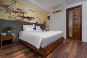 Voodi või voodid majutusasutuse Delicate Hotel toas