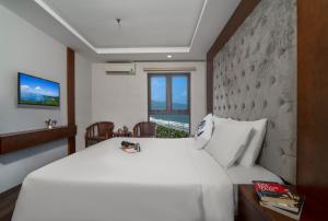 Voodi või voodid majutusasutuse Delicate Hotel toas