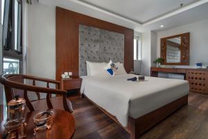 Voodi või voodid majutusasutuse Delicate Hotel toas