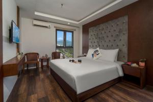 Voodi või voodid majutusasutuse Delicate Hotel toas