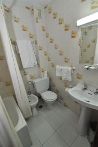 Kylpyhuone majoituspaikassa Hostal Goyma I