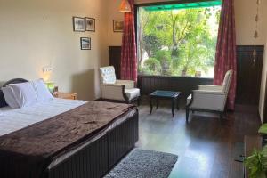 Imagen de la galería de Villa with tropical garden, en Chandīgarh