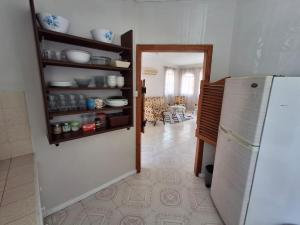 Kuchyň nebo kuchyňský kout v ubytování 4Beds- Beachfront Bungalow