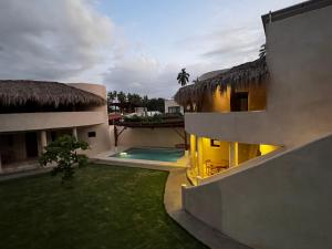 a view of a villa with a swimming pool at Villas Cononda in La Majahua